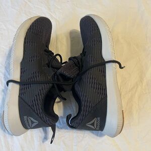 Reebok Black and White Athletic Shoes with Sleek Design